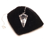 clear quartz pendulum on black velvet crystal pillow